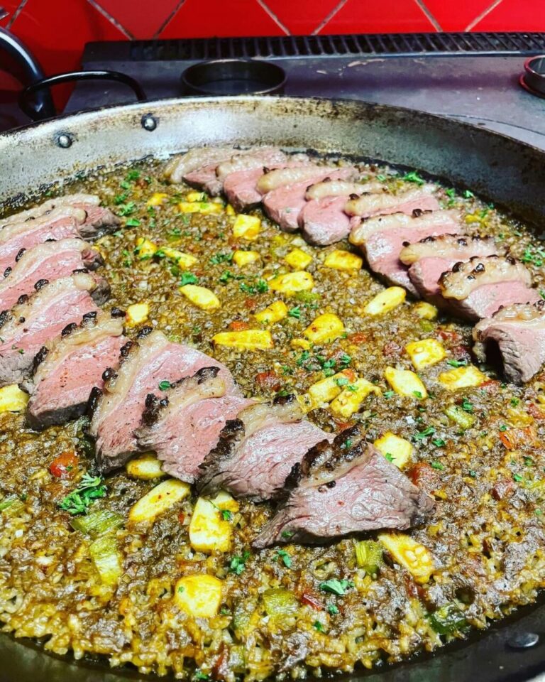 Arroz magret de canard, seiche de canet, boudin et escargots